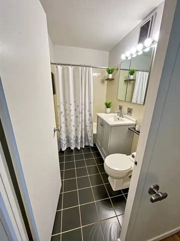 a view of a city with tall buildings