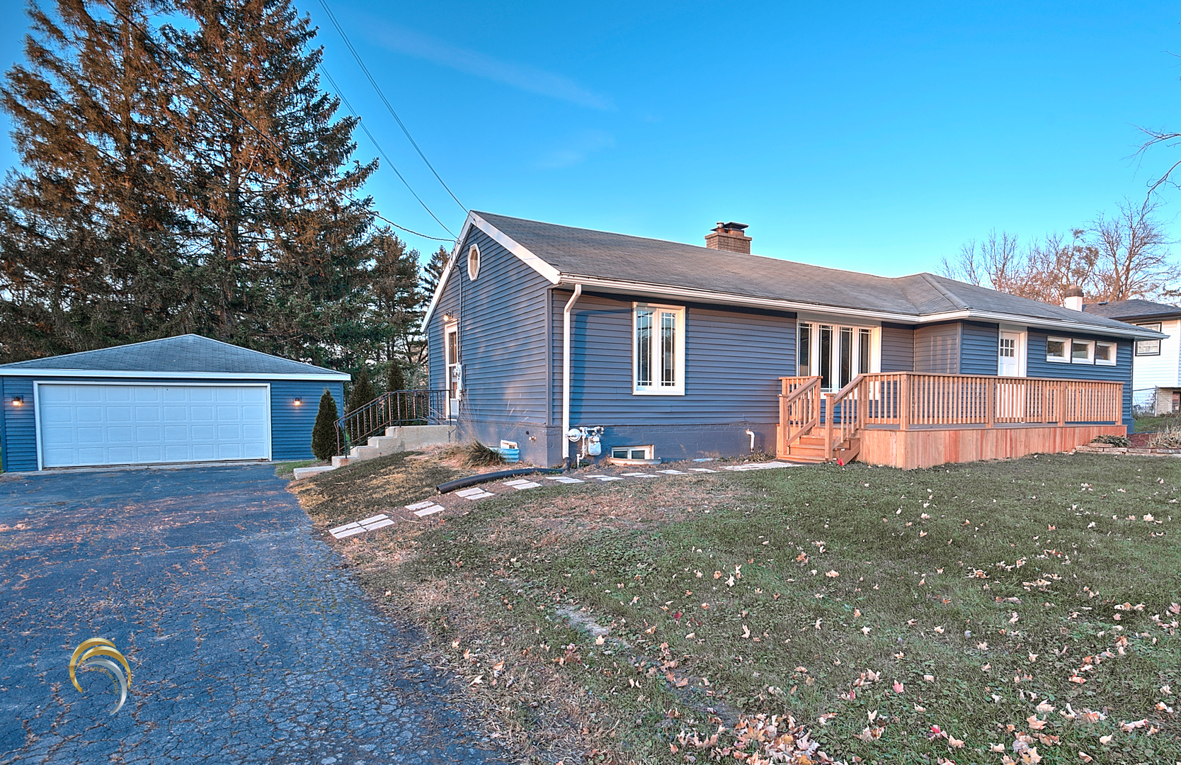 1016 Riedy Road Lisle, IL 60532 - Photo 1 of 17 a front view of a house with a yard and garage