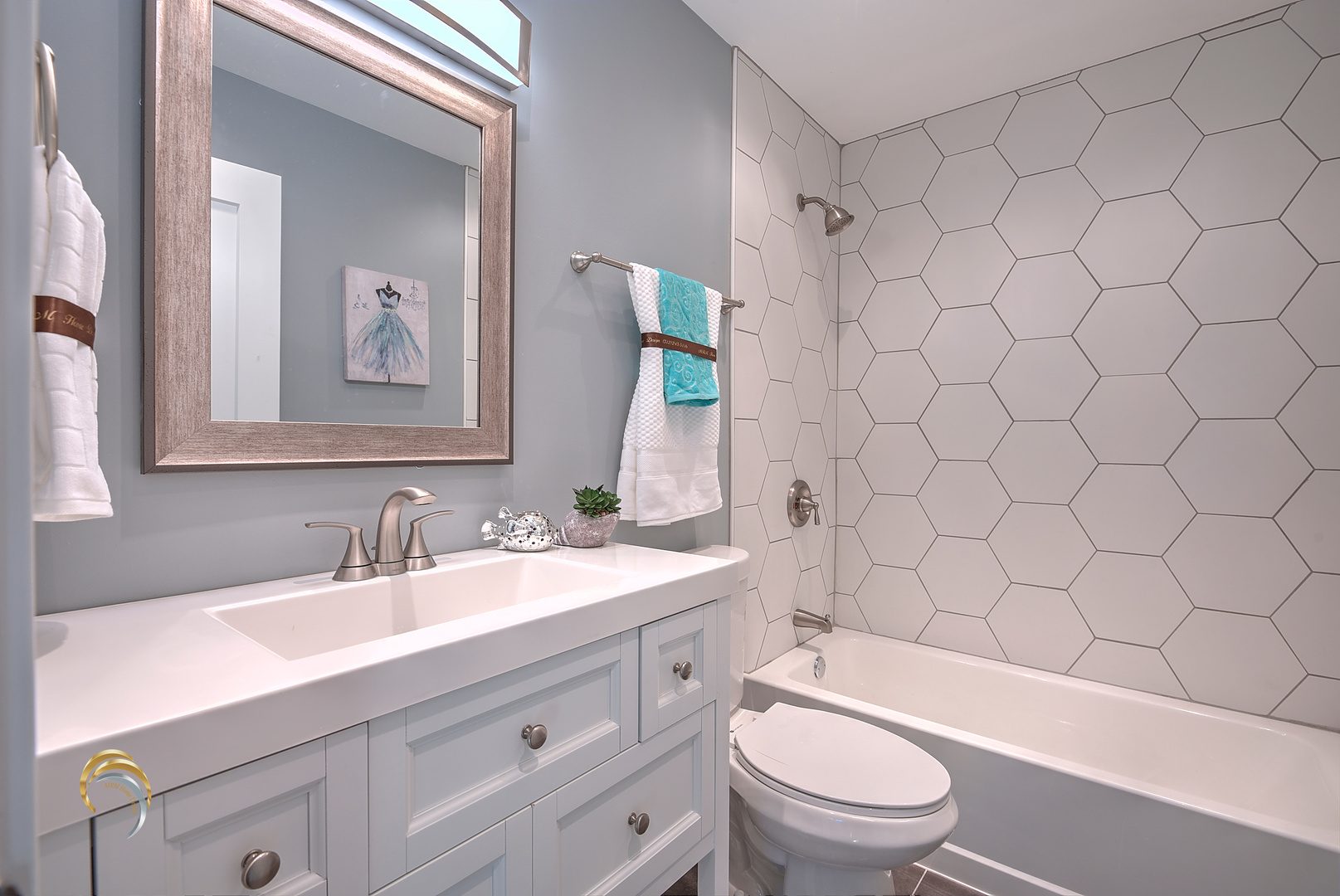 1016 Riedy Road Lisle, IL 60532 - Photo 11 of 17 a bathroom with a sink a toilet and shower