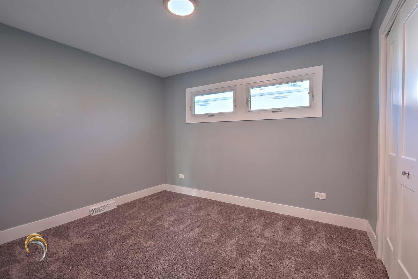 1016 Riedy Road Lisle, IL 60532 - Photo 15 of 17 an empty room with a window