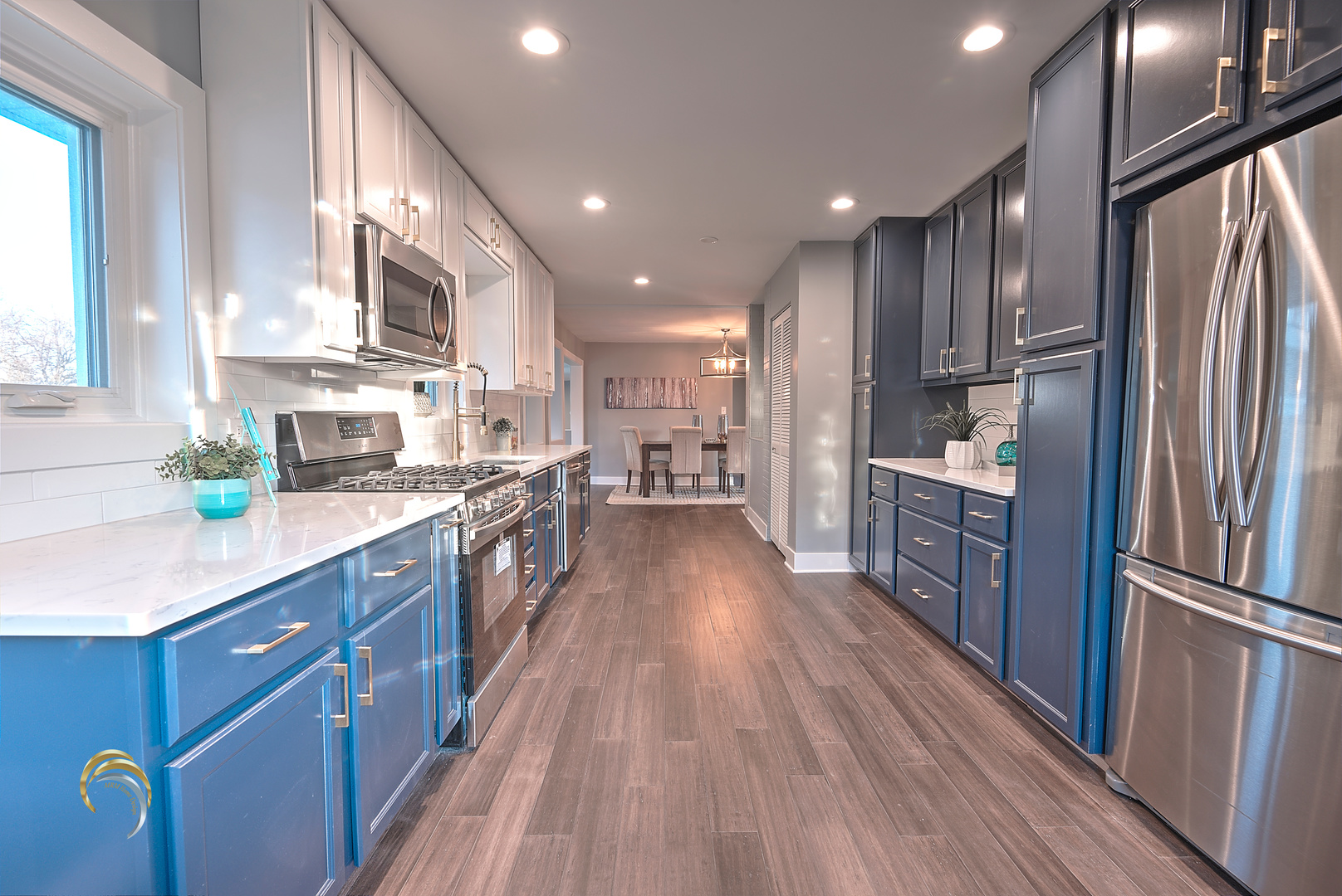 1016 Riedy Road Lisle, IL 60532 - Photo 8 of 17 a large kitchen with stainless steel appliances granite countertop a large counter top a sink a stove and a refrigerator