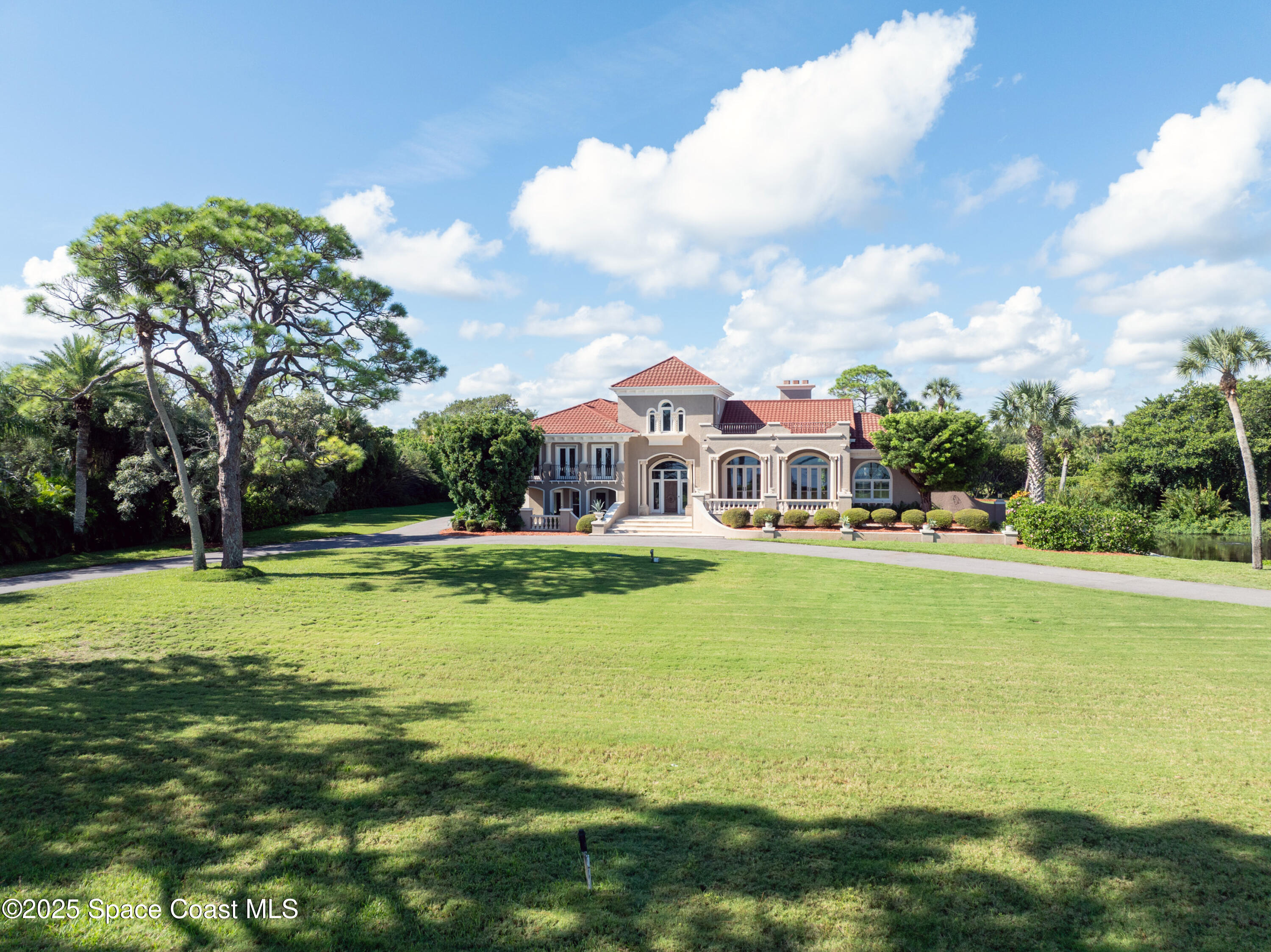 3000 Rocky Point Road Malabar, FL 32950 - Photo 4 of 91 Spacious circular driveway