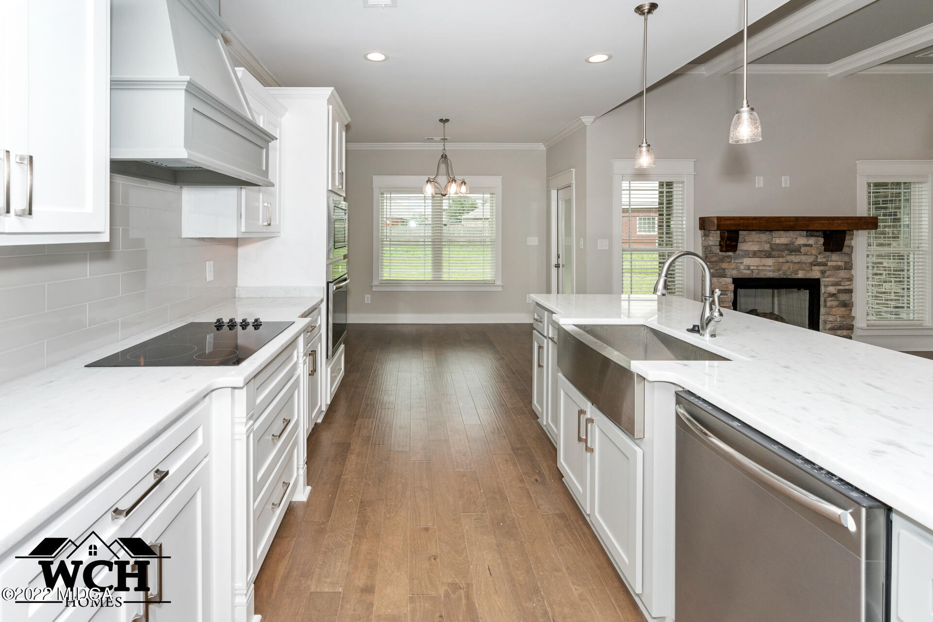 107 Perth Court Warner Robins, GA 31088 - Photo 12 of 27 a kitchen with granite countertop a sink a counter space appliances and cabinets