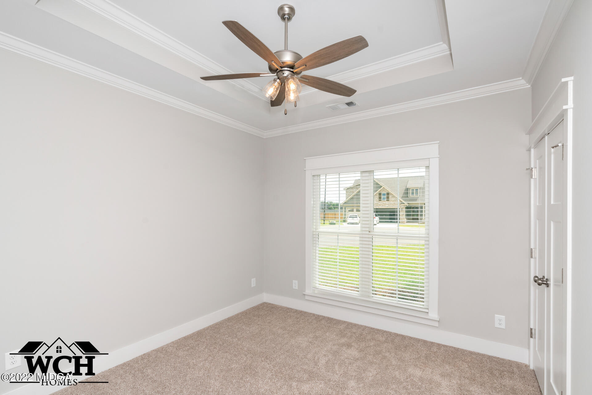 107 Perth Court Warner Robins, GA 31088 - Photo 17 of 27 a view of a livingroom with a ceiling fan and window