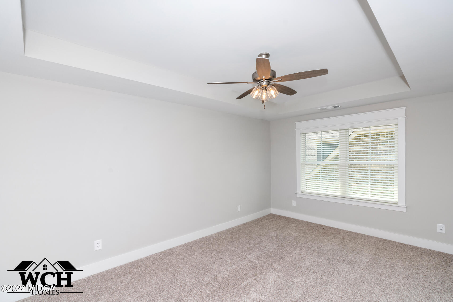 107 Perth Court Warner Robins, GA 31088 - Photo 22 of 27 a view of a livingroom with a ceiling fan and window
