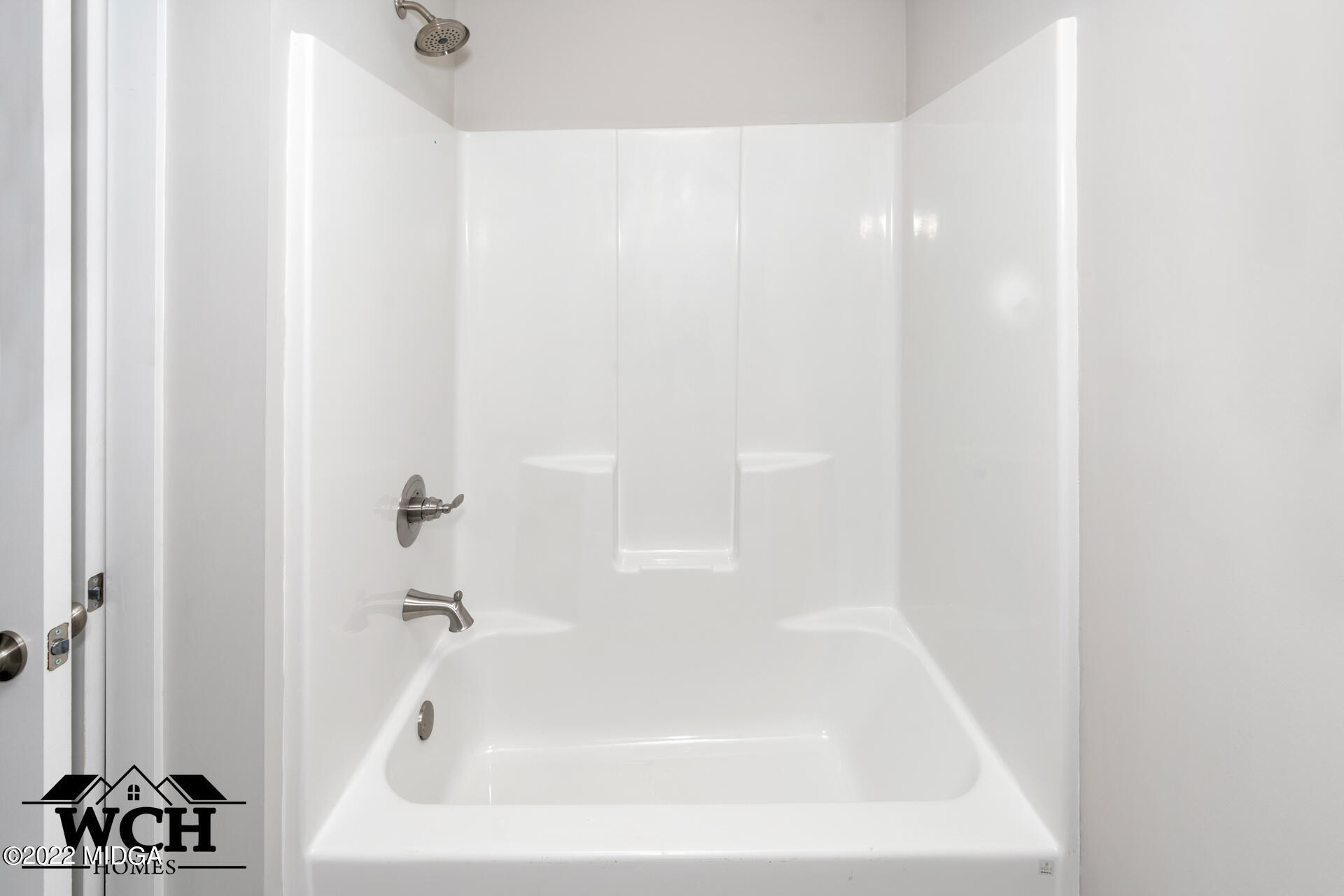 107 Perth Court Warner Robins, GA 31088 - Photo 24 of 27 a white bath tub sitting next to a white sink