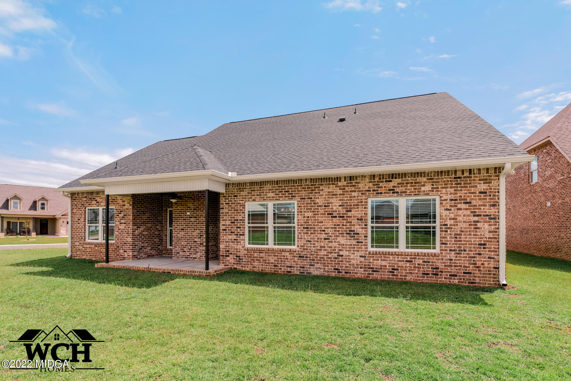 107 Perth Court Warner Robins, GA 31088 - Photo 26 of 27 a front view of a house with garden