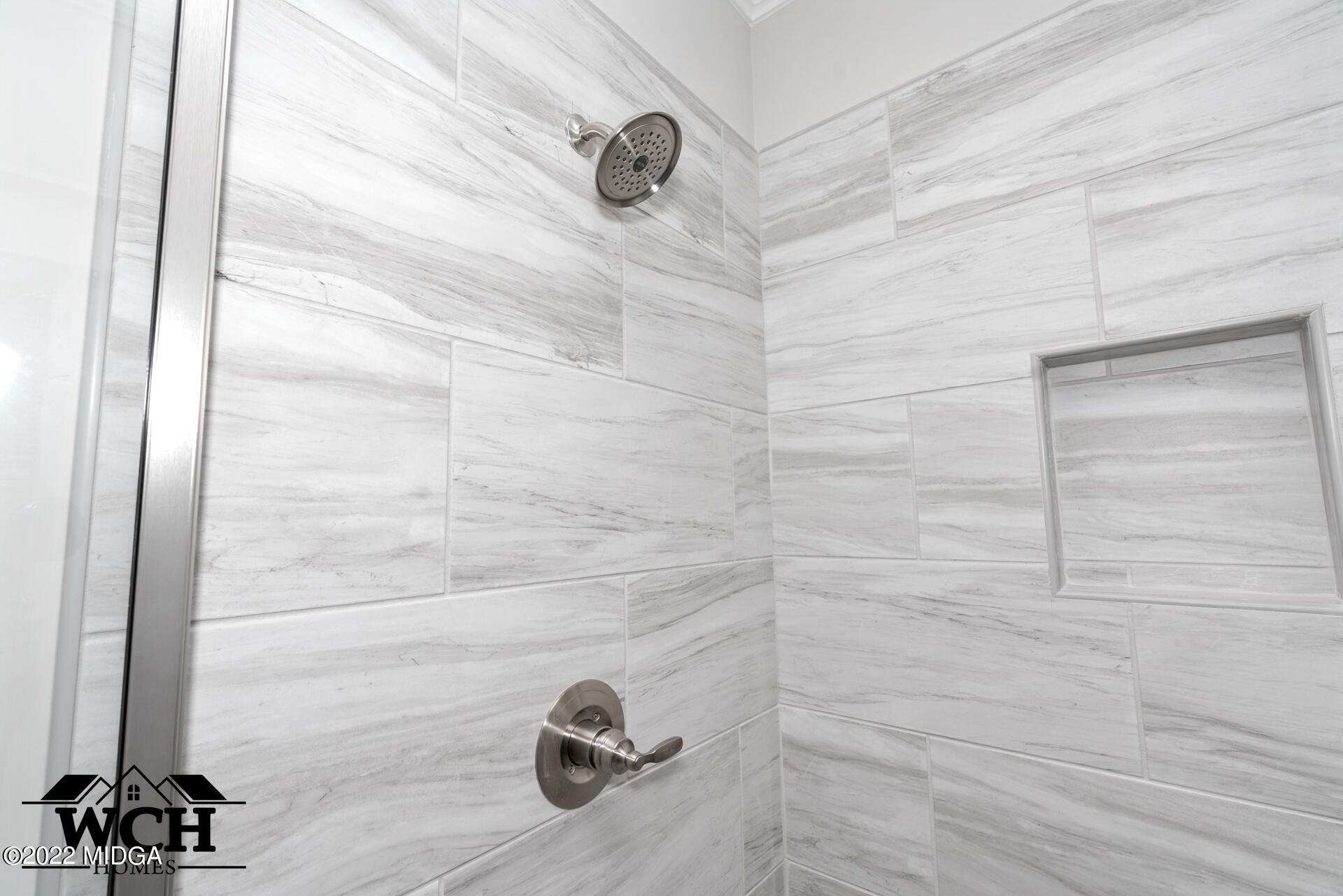 107 Perth Court Warner Robins, GA 31088 - Photo 6 of 27 a bathroom with a shower