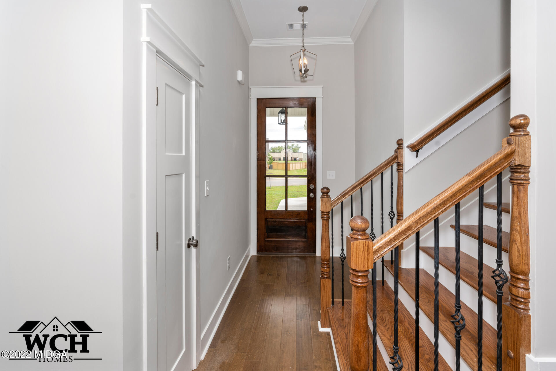 107 Perth Court Warner Robins, GA 31088 - Photo 9 of 27 a view of entryway and hall with wooden floor