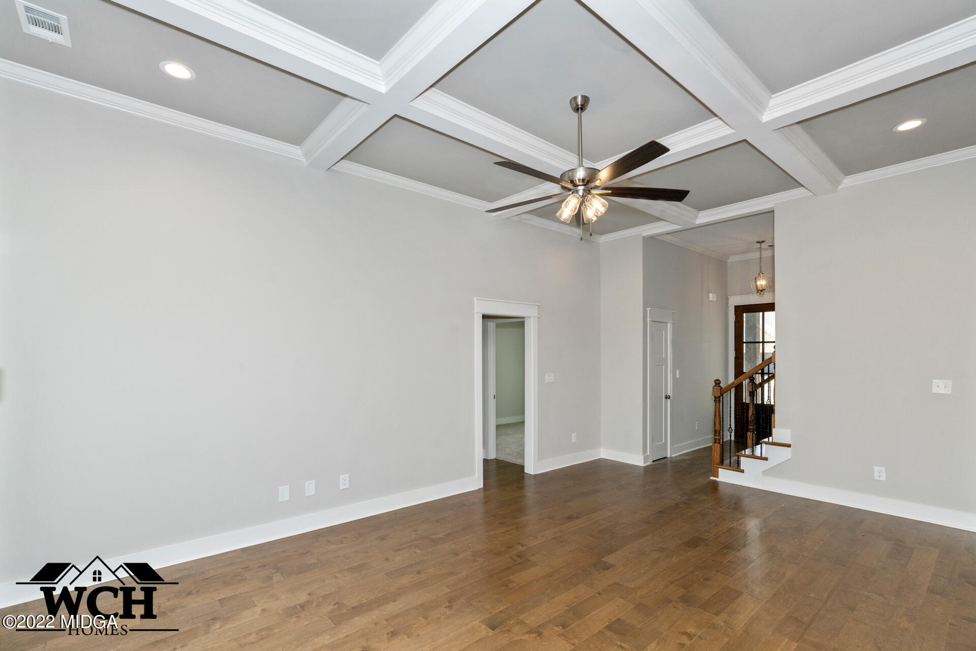 107 Perth Court Warner Robins, GA 31088 - Photo 10 of 27 wooden floor in an empty room with a window