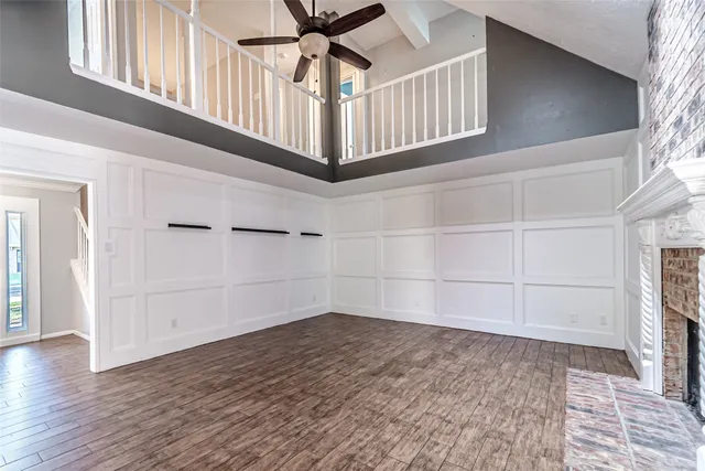 a kitchen with stainless steel appliances a refrigerator and a stove top oven
