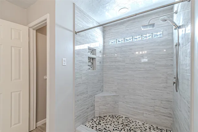 a bathroom with a double vanity sink mirror and next