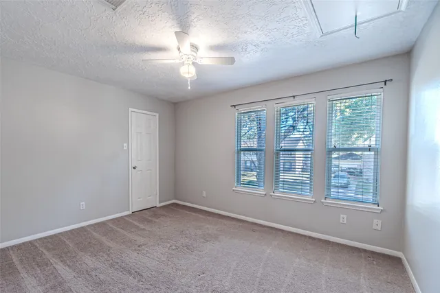a view of a backyard with a sitting area and slide