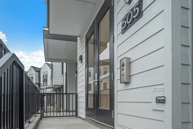 a view of a house with a street