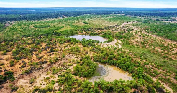 a view of a lake with outdoor space