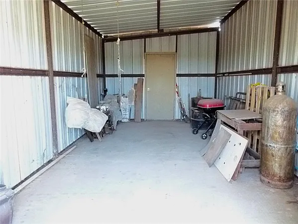 a view of an empty space and garden