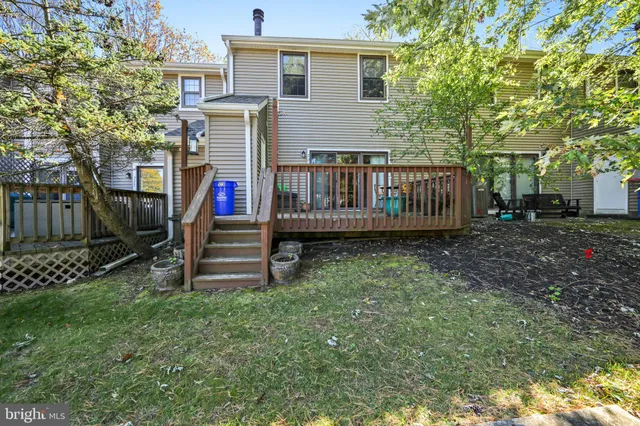 a view of a deck with a yard
