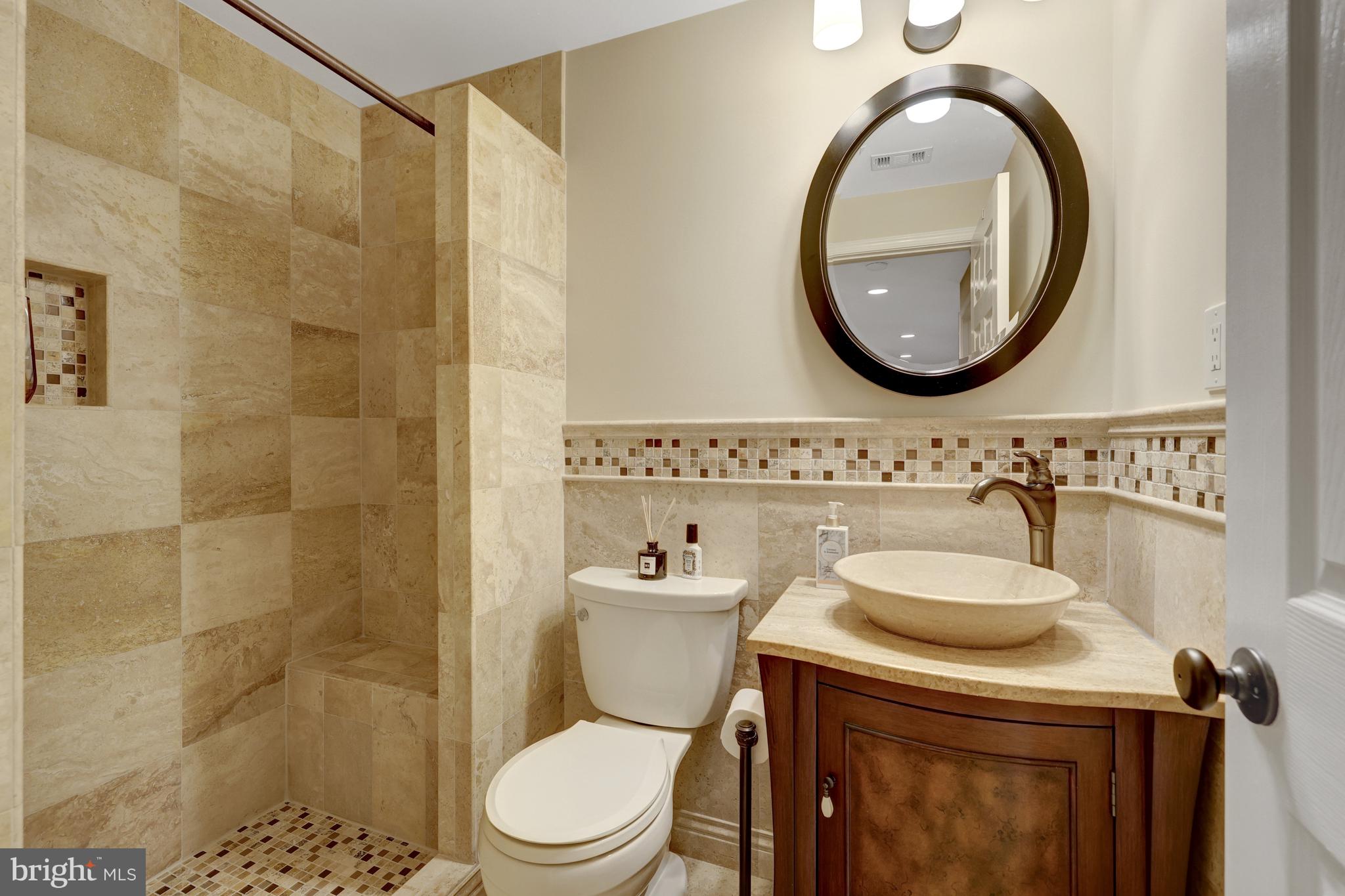 11122 Lakespray Way Reston, VA 20191 - Photo 61 of 77 The lower level has an updated full hall bathroom.