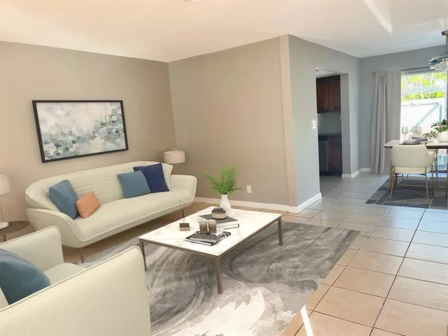 a living room with a couch and a table