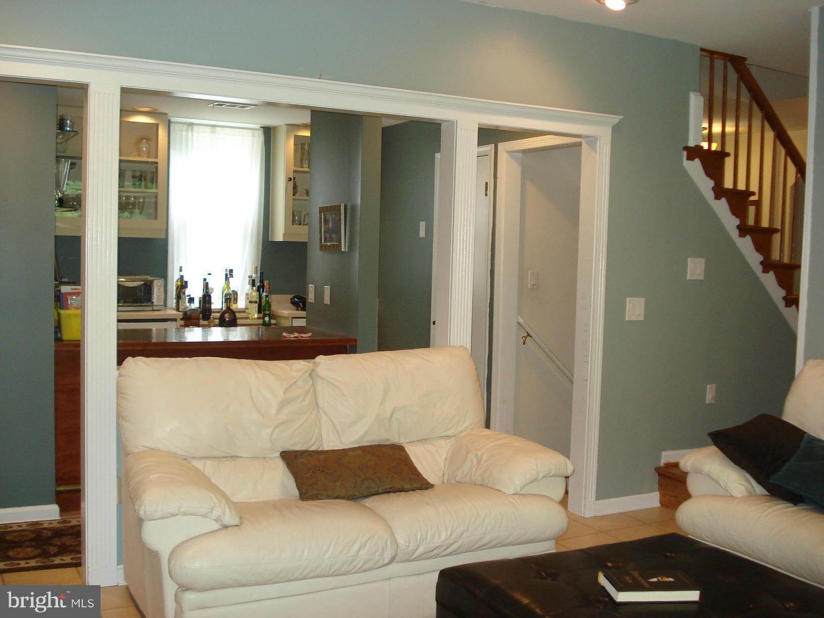 5202 Eliots Oak Road Columbia, MD 21044 - Photo 9 of 30 Family Room with petite Bar Area behind and above.