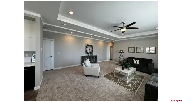 a kitchen with a sink a stove and cabinets