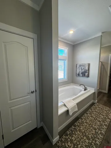 a bathroom with 2 sink and a mirror