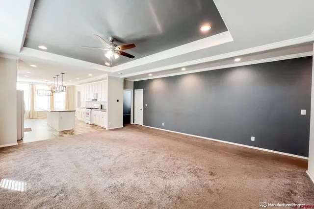 a kitchen with counter top space a sink and appliances