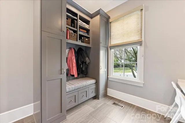 a utility room with sink dryer and washer