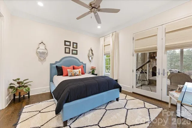a kitchen view with a stove and a wooden floors