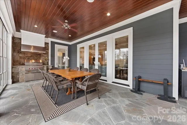 a bedroom with a bed and with furniture