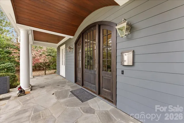 a view of entrance gate of a house