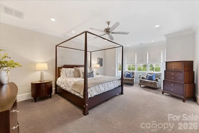 a spacious bathroom with a tub shower and bedroom