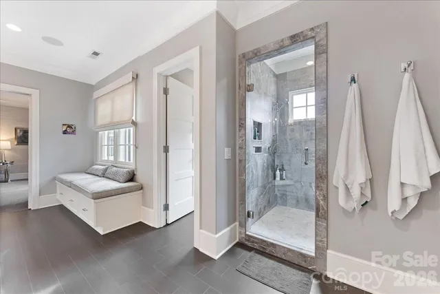 a view of a livingroom with furniture and a flat screen tv