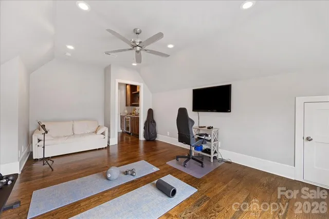 a view of a swimming pool and trees in the background