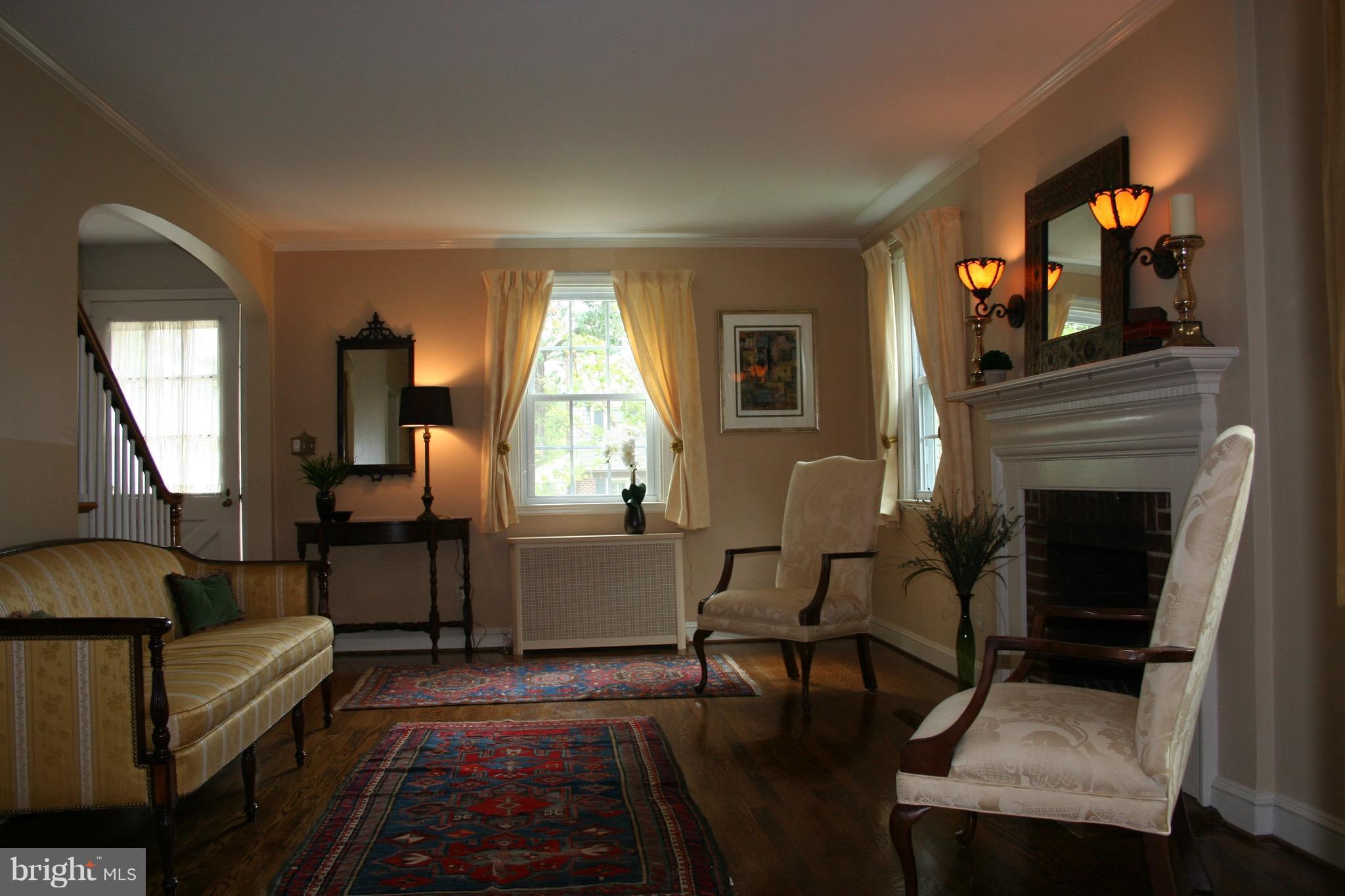 720 Murdock Road Baltimore, MD 21212 - Photo 3 of 27 a living room with furniture and a fireplace