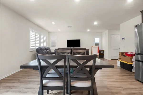 a view of a dining room with furniture