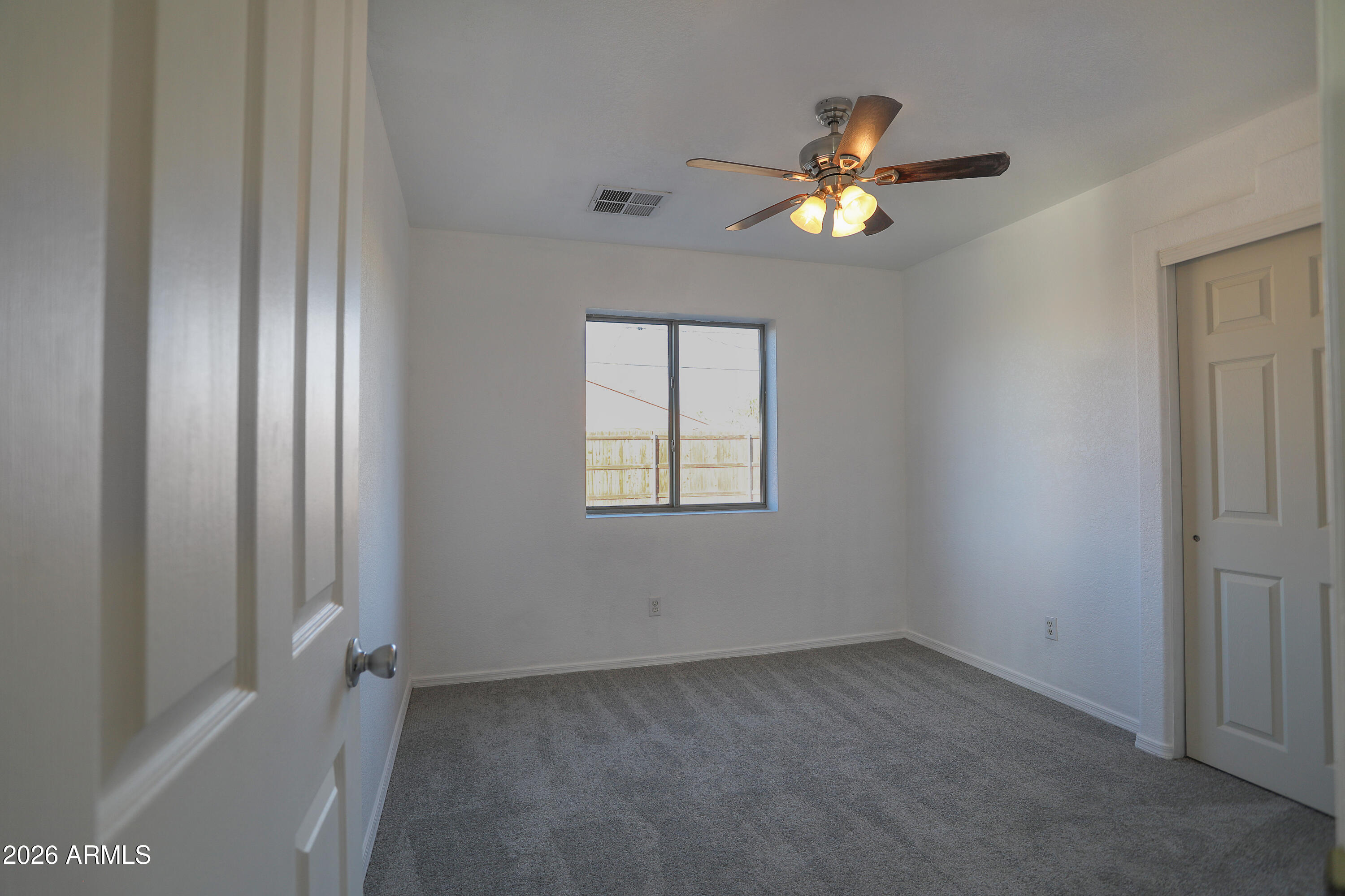 762 West 17th Avenue Apache Junction, AZ 85120 - Photo 13 of 19 a view of empty room with window