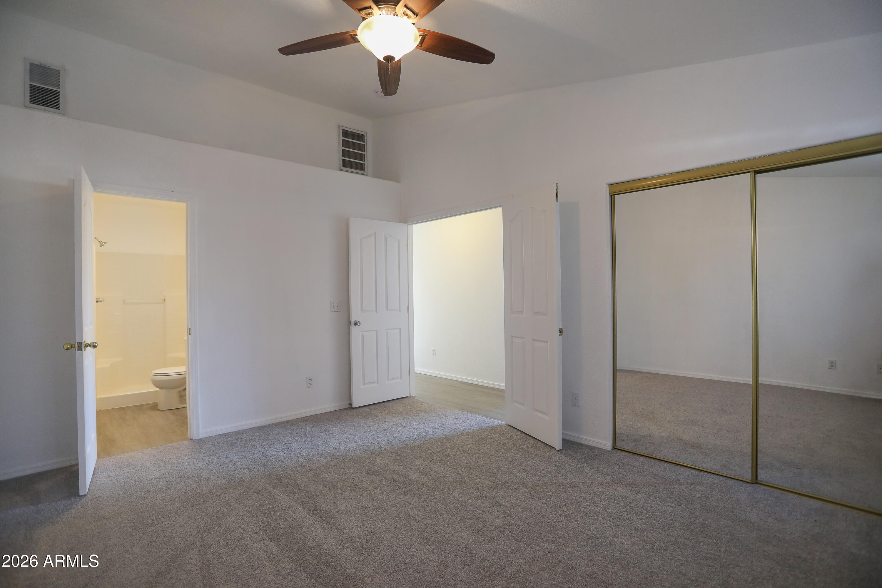 762 West 17th Avenue Apache Junction, AZ 85120 - Photo 9 of 19 a view of an empty room with a bathroom