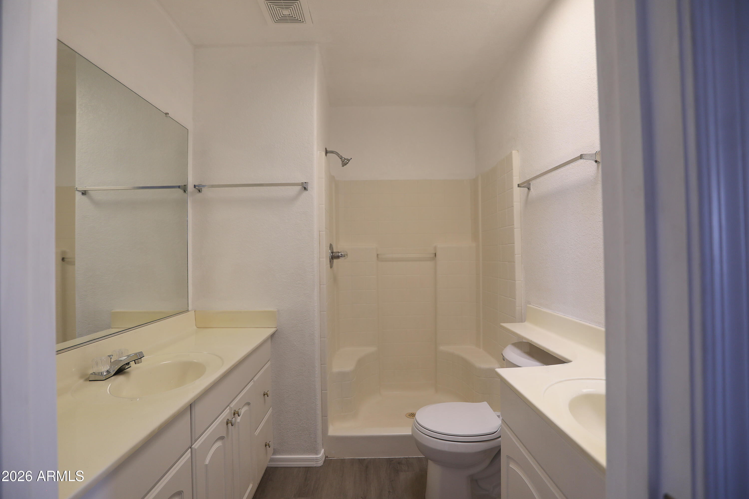 762 West 17th Avenue Apache Junction, AZ 85120 - Photo 10 of 19 a bathroom with a granite countertop sink toilet and shower