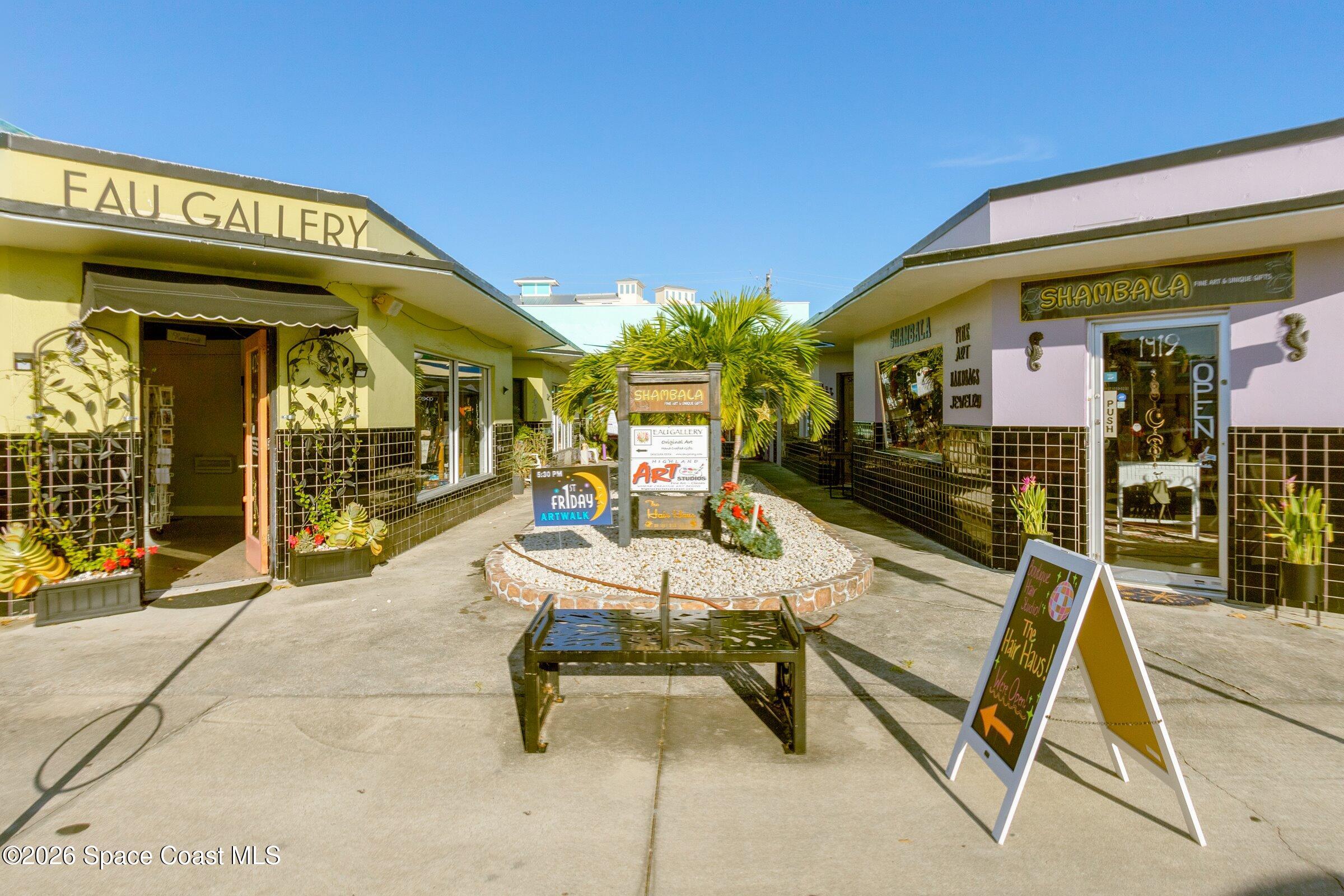 2780 Reston Street, Unit 105 Melbourne, FL 32935 - Photo 30 of 32 a view of a building with sitting area