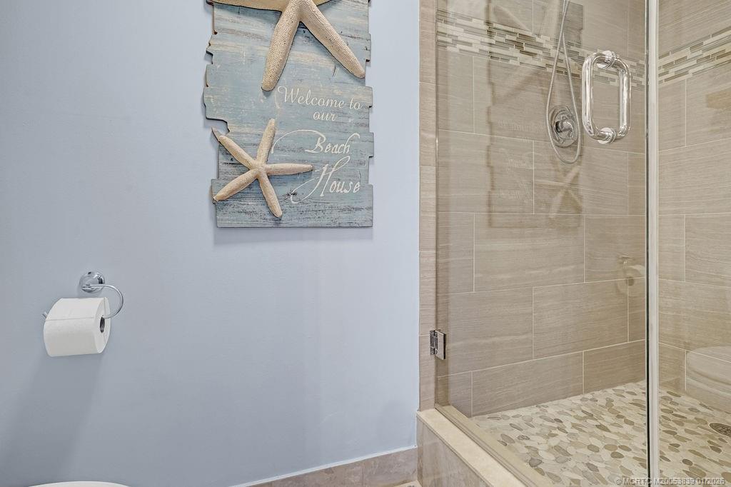 2355 Northeast Ocean Boulevard, Unit 39B Stuart, FL 34996 - Photo 17 of 22 a bathroom with a shower