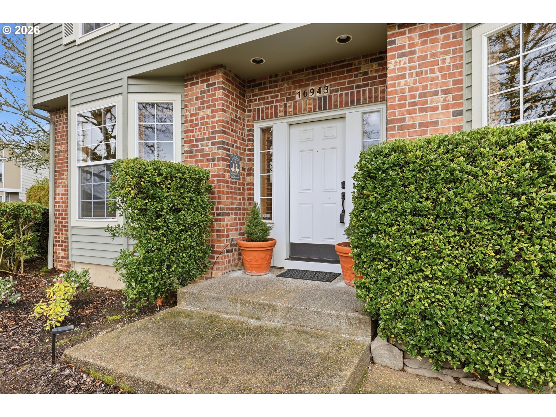 16943 Northwest Patrick Lane Portland, OR 97229 - Photo 11 of 45 a view of a house with potted plants