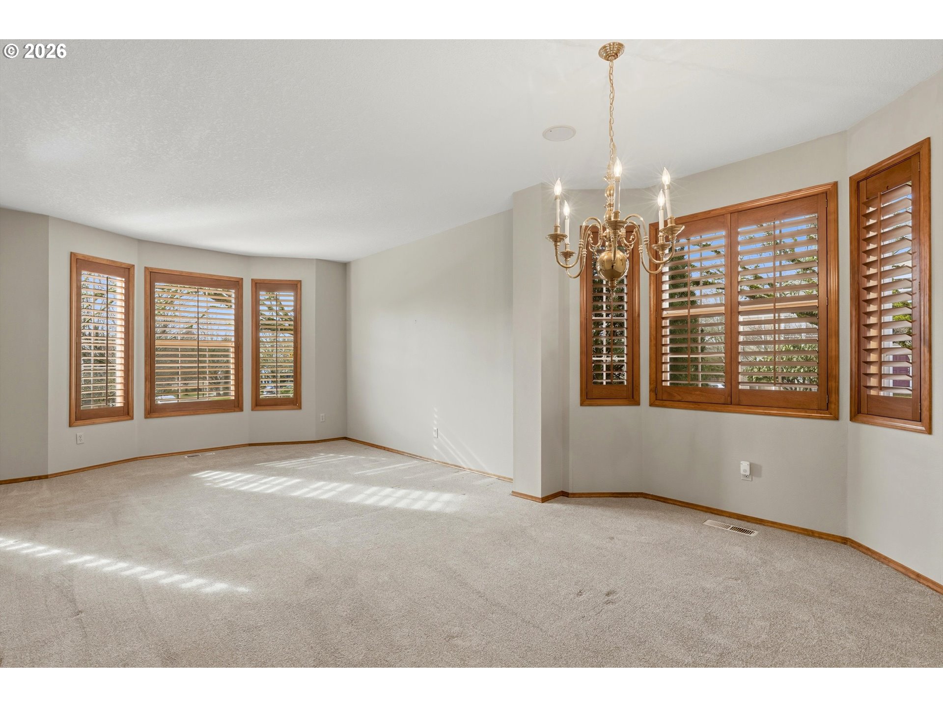 16943 Northwest Patrick Lane Portland, OR 97229 - Photo 14 of 45 a view of an empty room with a window