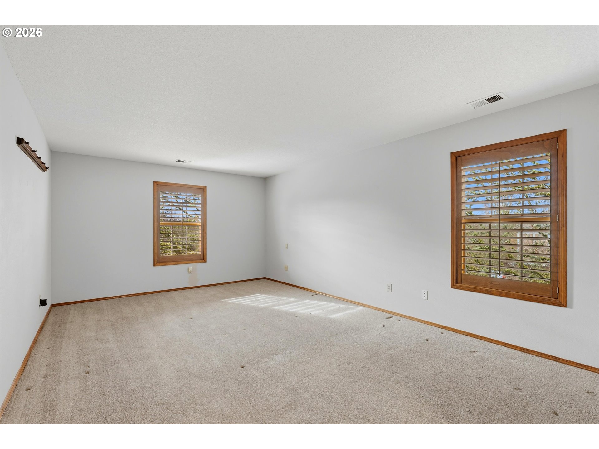 16943 Northwest Patrick Lane Portland, OR 97229 - Photo 24 of 45 a view of an empty room with a window