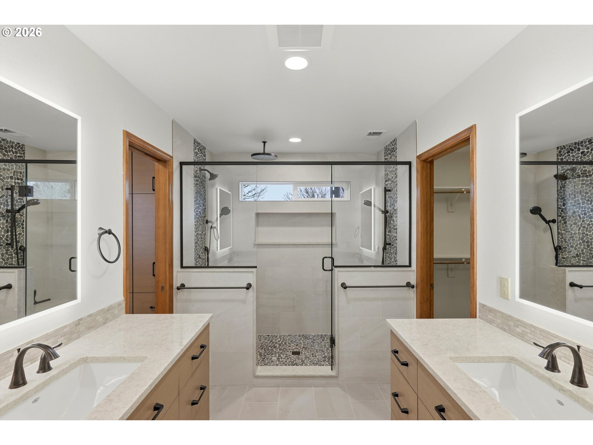 16943 Northwest Patrick Lane Portland, OR 97229 - Photo 27 of 45 a bathroom with a tub sink and mirror