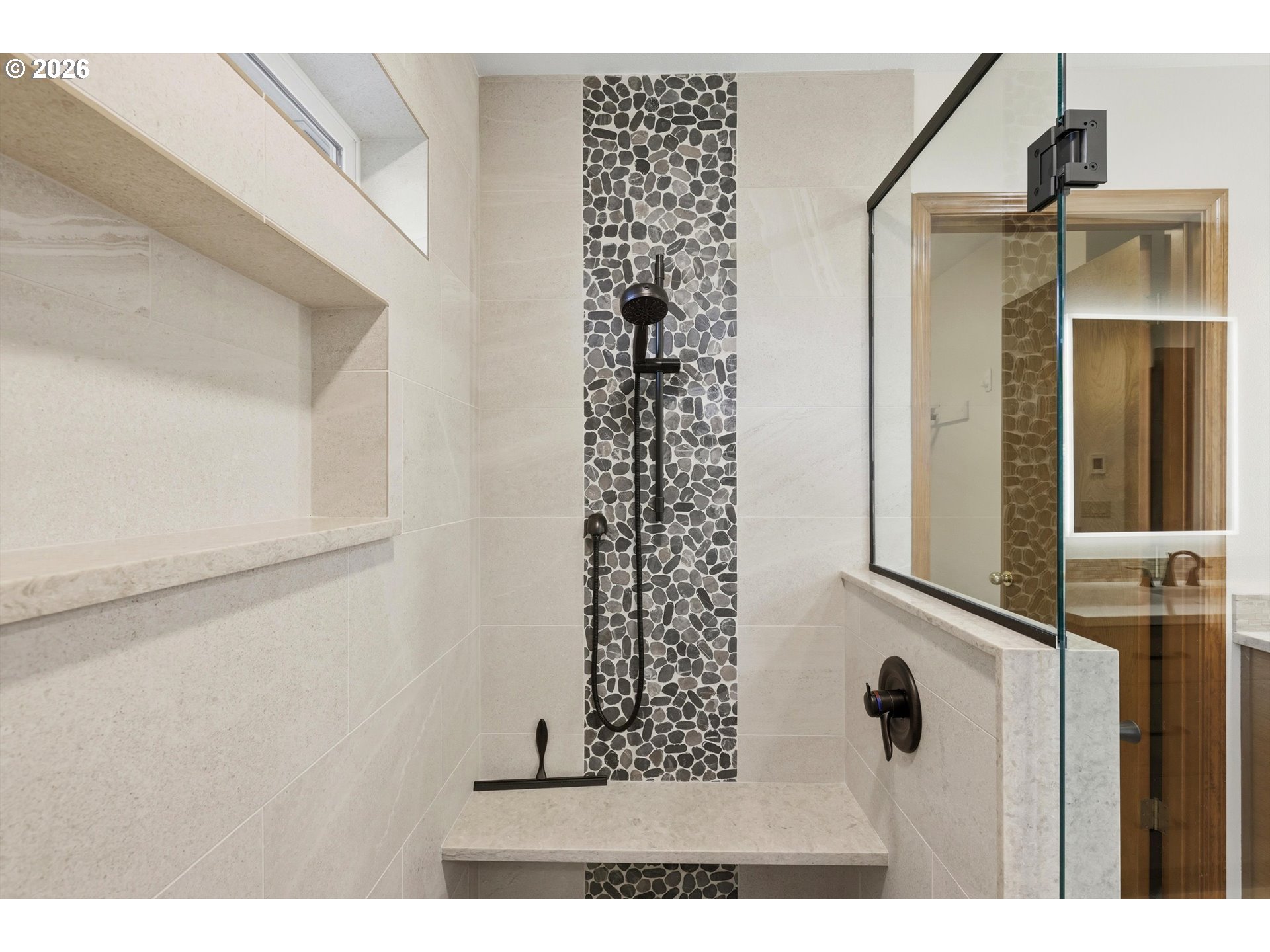 16943 Northwest Patrick Lane Portland, OR 97229 - Photo 28 of 45 a view of a closet area with wooden floor
