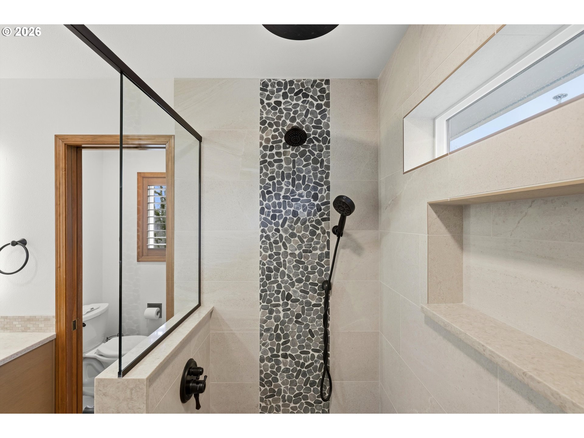 16943 Northwest Patrick Lane Portland, OR 97229 - Photo 29 of 45 a bathroom with a bathtub and a shower