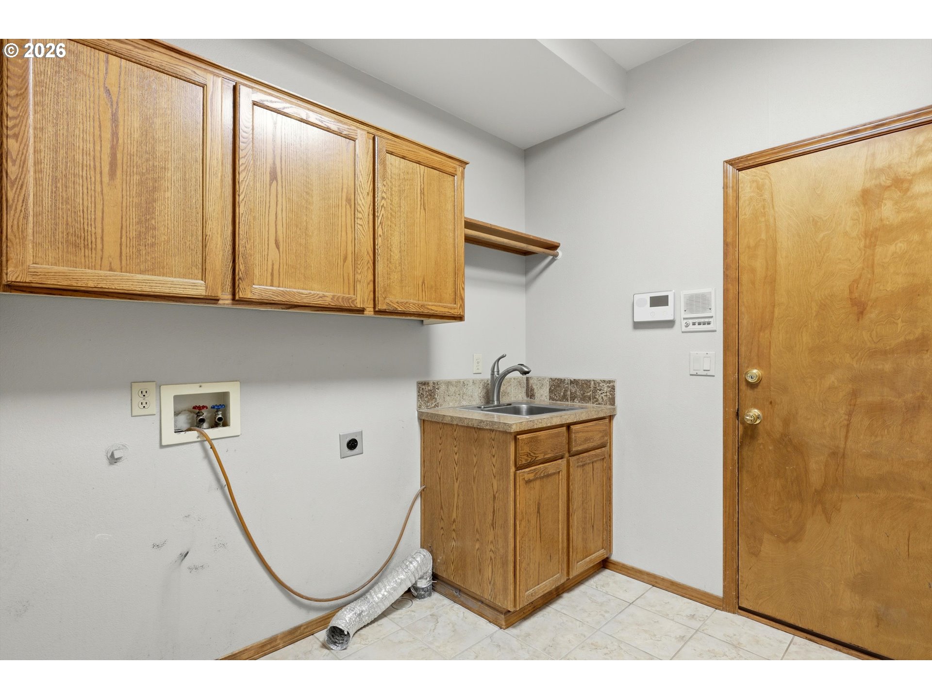 16943 Northwest Patrick Lane Portland, OR 97229 - Photo 41 of 45 a bathroom with a sink and a mirror