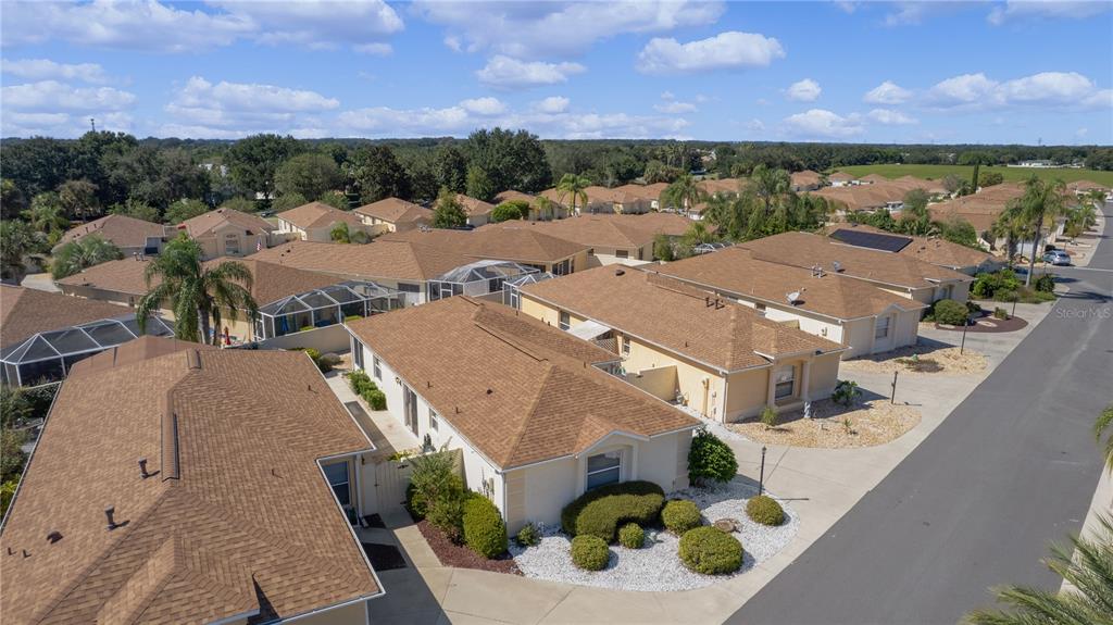 1116 San Bernardo Road The Villages, FL 32162 - Photo 39 of 46 an aerial view of residential houses with outdoor space and ocean view