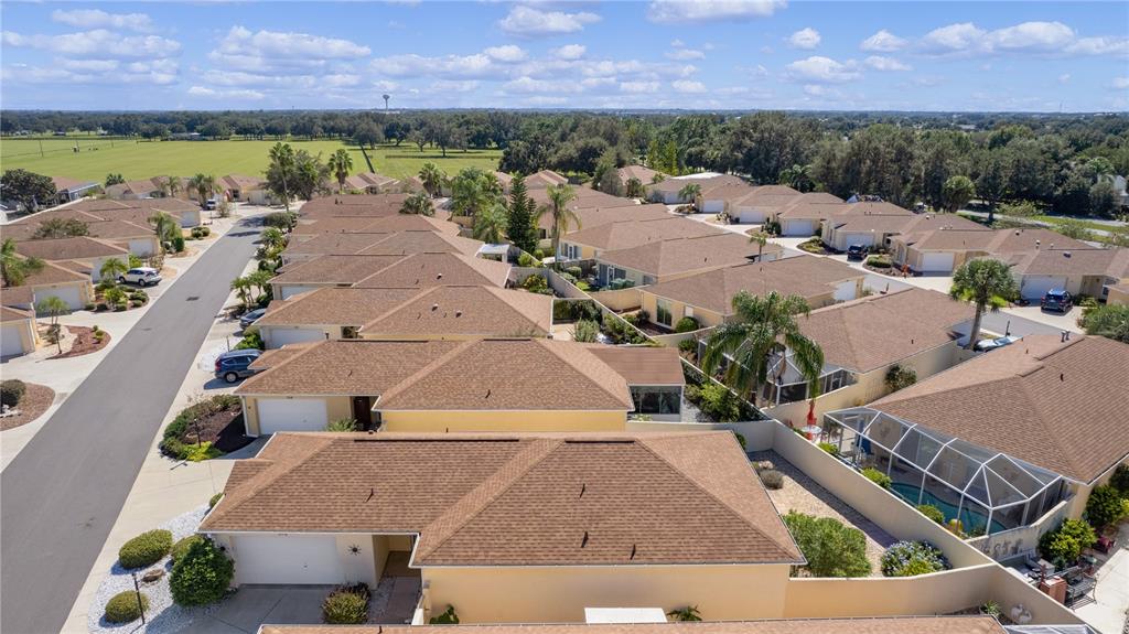 1116 San Bernardo Road The Villages, FL 32162 - Photo 44 of 46 an aerial view of a house with a lake view